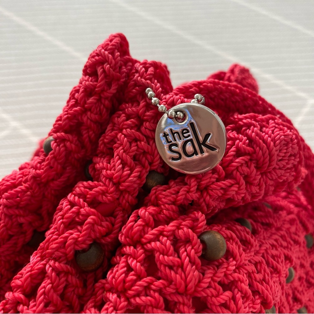 The Sak Red Boho Small Lined Crochet Drawstring Bucket Bag Crossbody - Picture 9 of 11